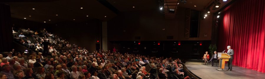 Lecture hall filled with people.